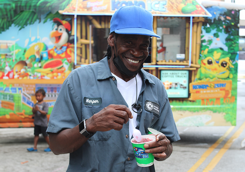 man enjoying kona ice